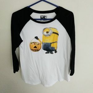 Minion holding a holloween bucket